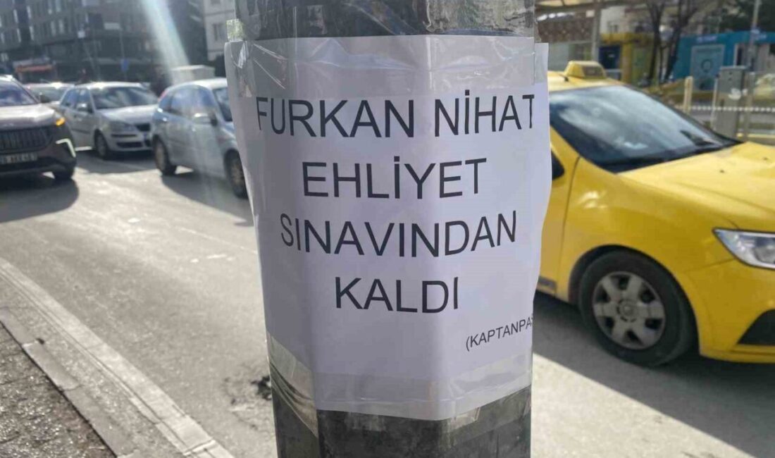 Eskişehir’de bir direğin üzerine yapıştırılan, “Furkan Nihat ehliyet sınavından kaldı”